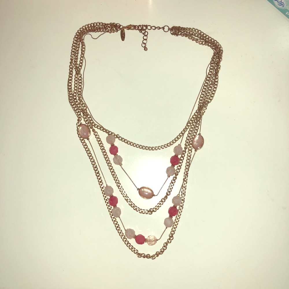 Gold necklace with pink stones